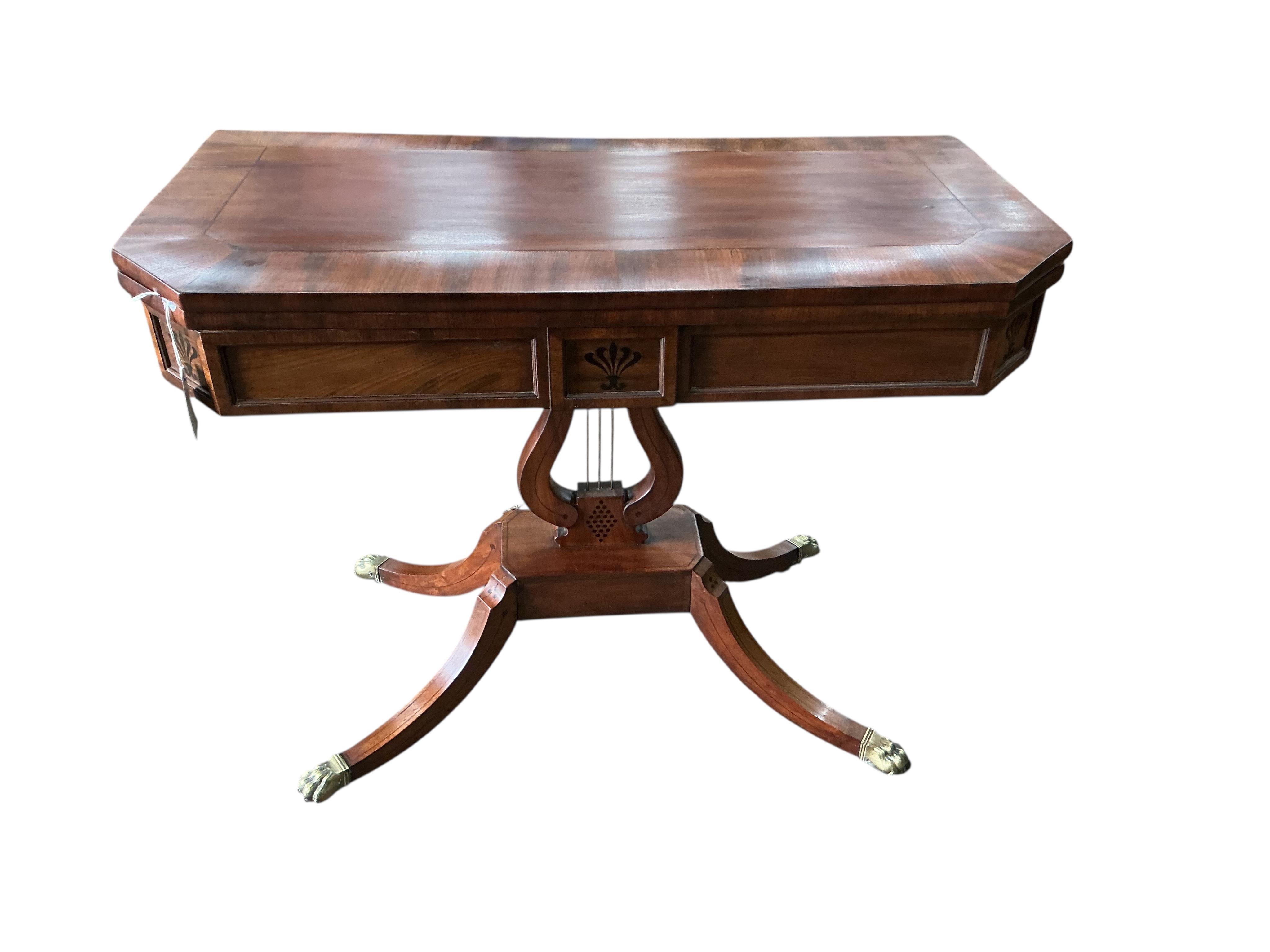 A Regency inlaid mahogany folding card table, width 92cm, depth 46cm, height 73cm